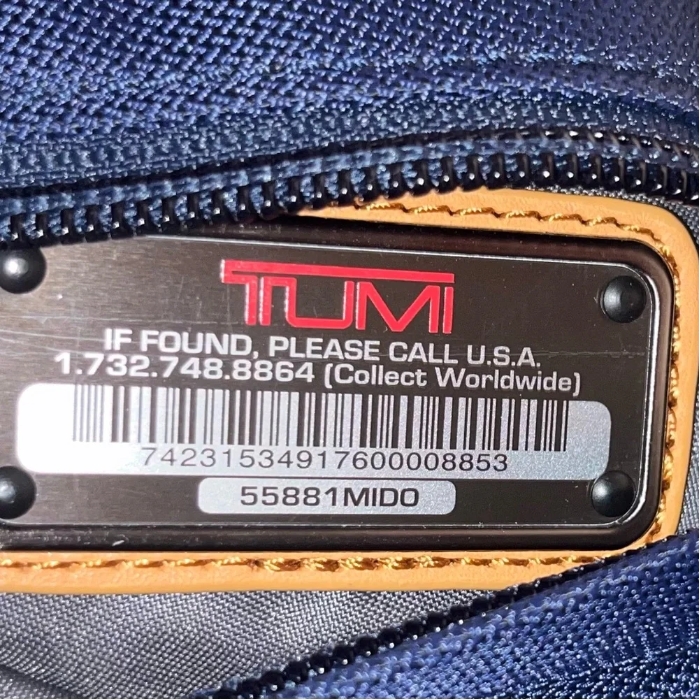 Tumi Blue & Black Roll-Top Backpack with Leather Trim